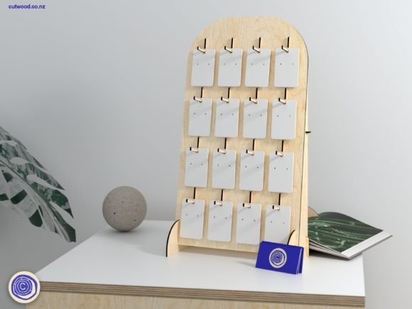 Laser cut wooden earring display stand for presenting handmade earrings and jewelry at craft markets.
