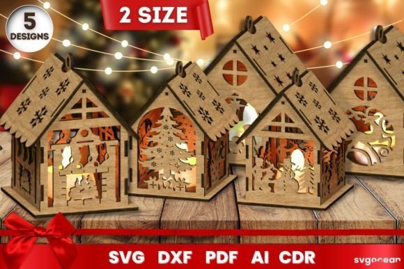 Laser cut Christmas houses arranged as a small illuminated wooden village